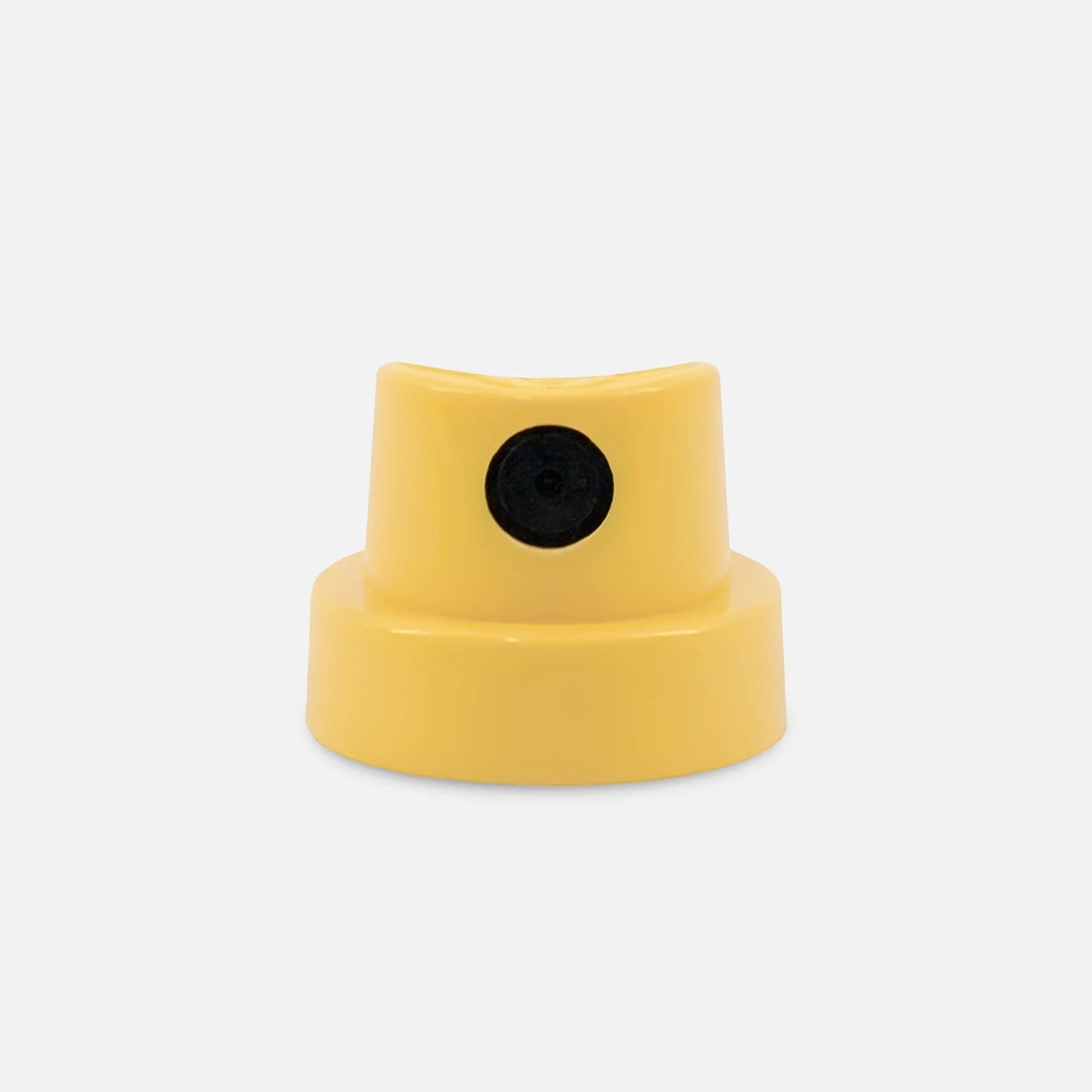 Yellow super fat cap with a black dot on a light grey background